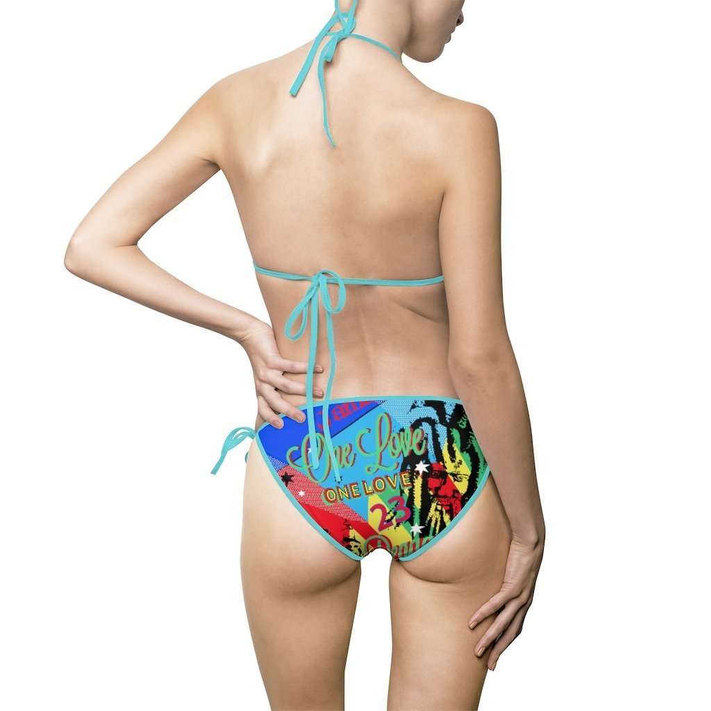 One Love Reggae party swimsuit at Rasta gear shop. Original keyhole design with ocean blue straps or black straps.