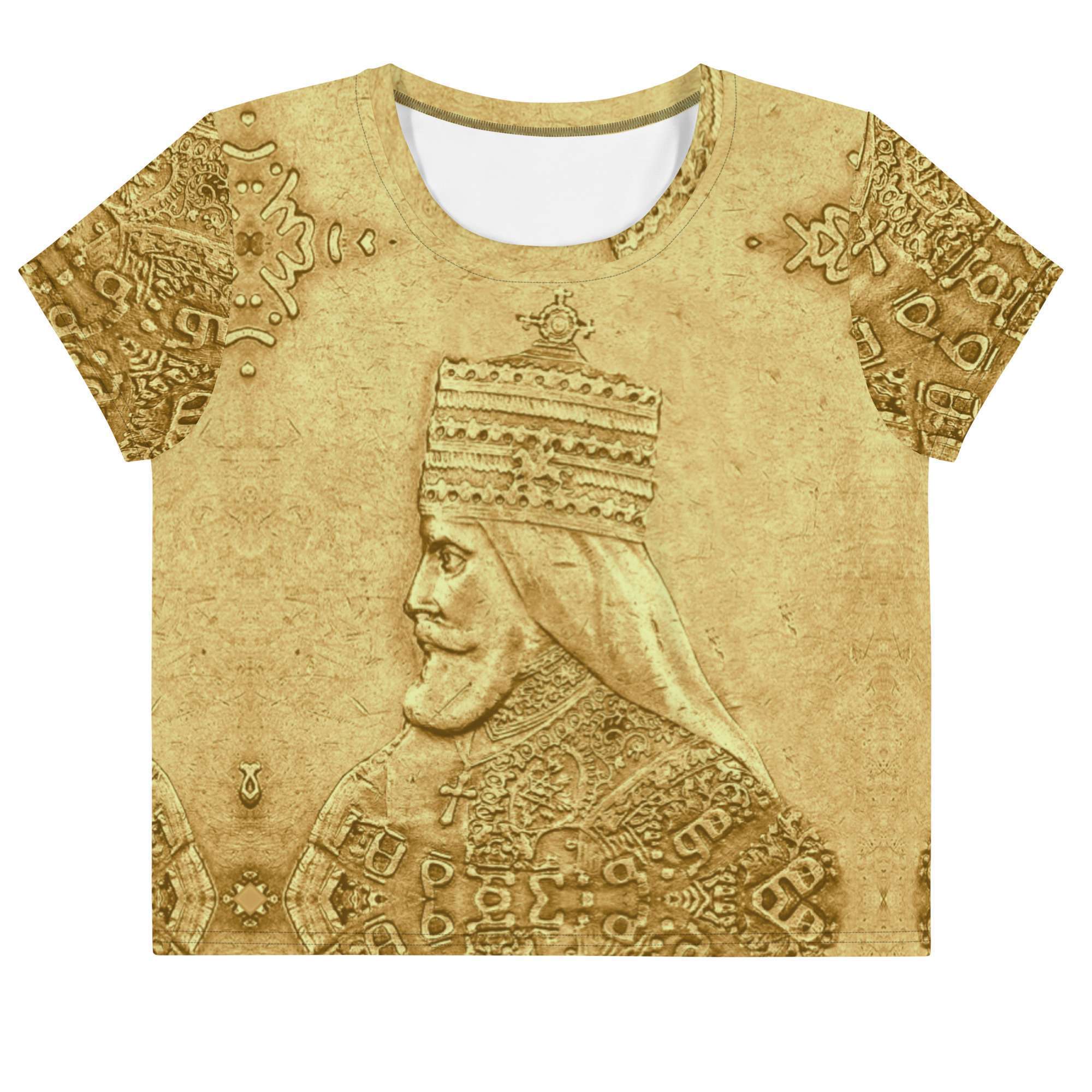 Haile Selassie Ancient Amharic Crop Tee front flat view in gold hues. King of Kings design, an original from Rastaseed online clothing store and Rasta gear.