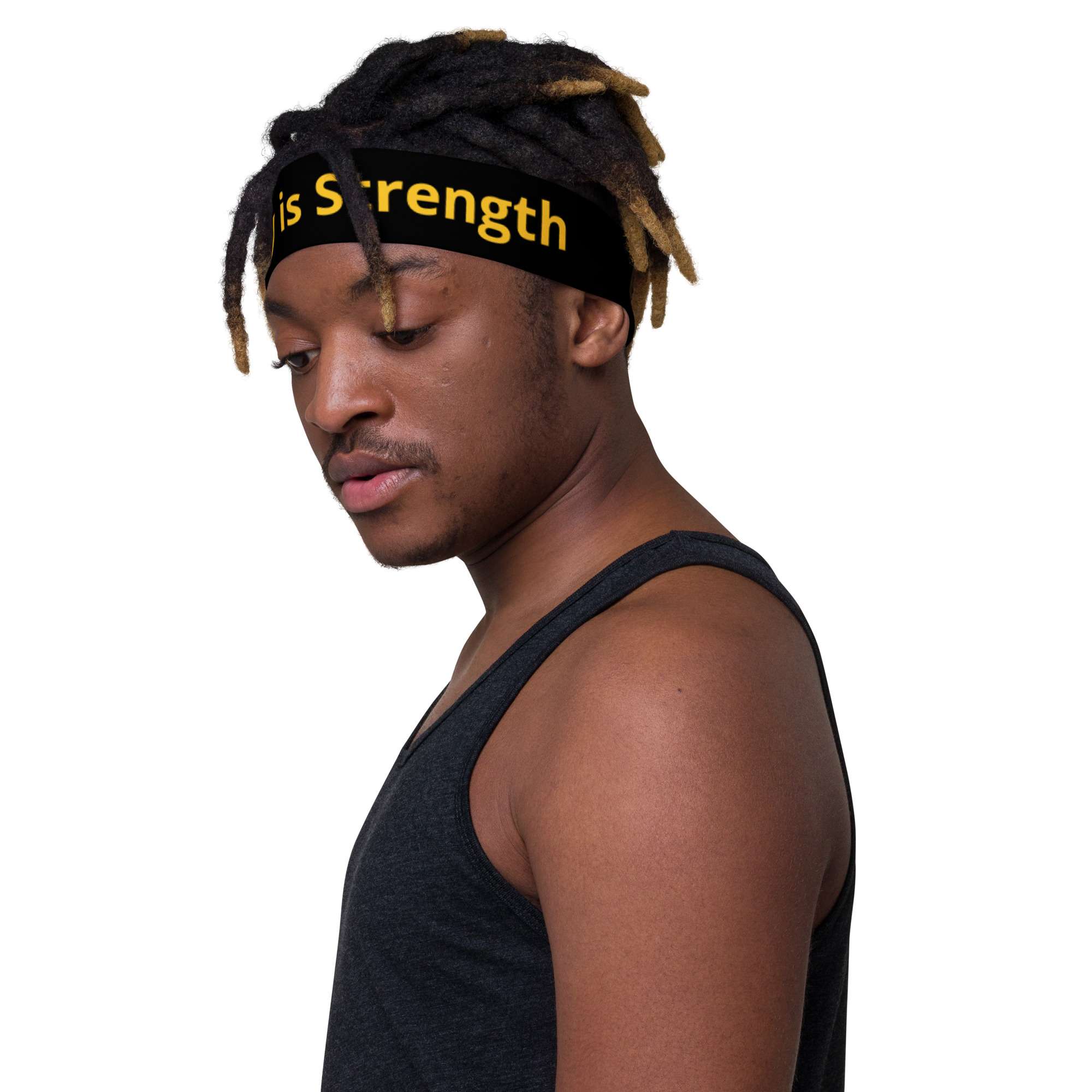 Unity is Strength Headband in black with yellow text male side view. Stretchy and comfortable. Make a statement, available at Rastaseed clothing and accessories.