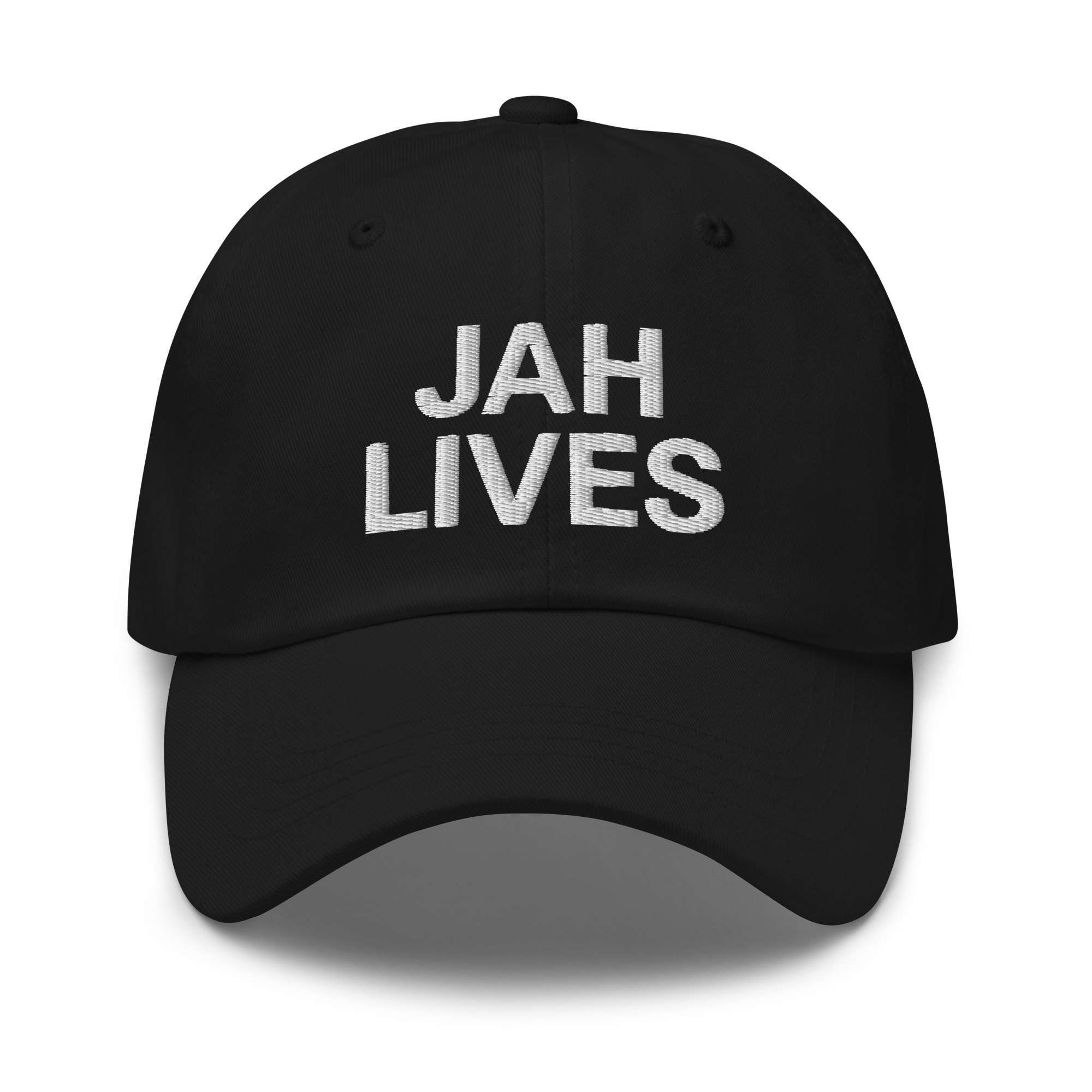 Jah Lives Cap front view black available in camouflage print and black colours. Dad hat style with white embroidered lettering. Rastaseed online Rasta shop.