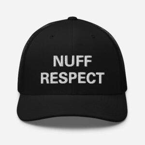 Nuff Respect Jamaican Trucker Cap front view. Original embroidered Patois phrase on black trucker hat with mesh back and curved visor.