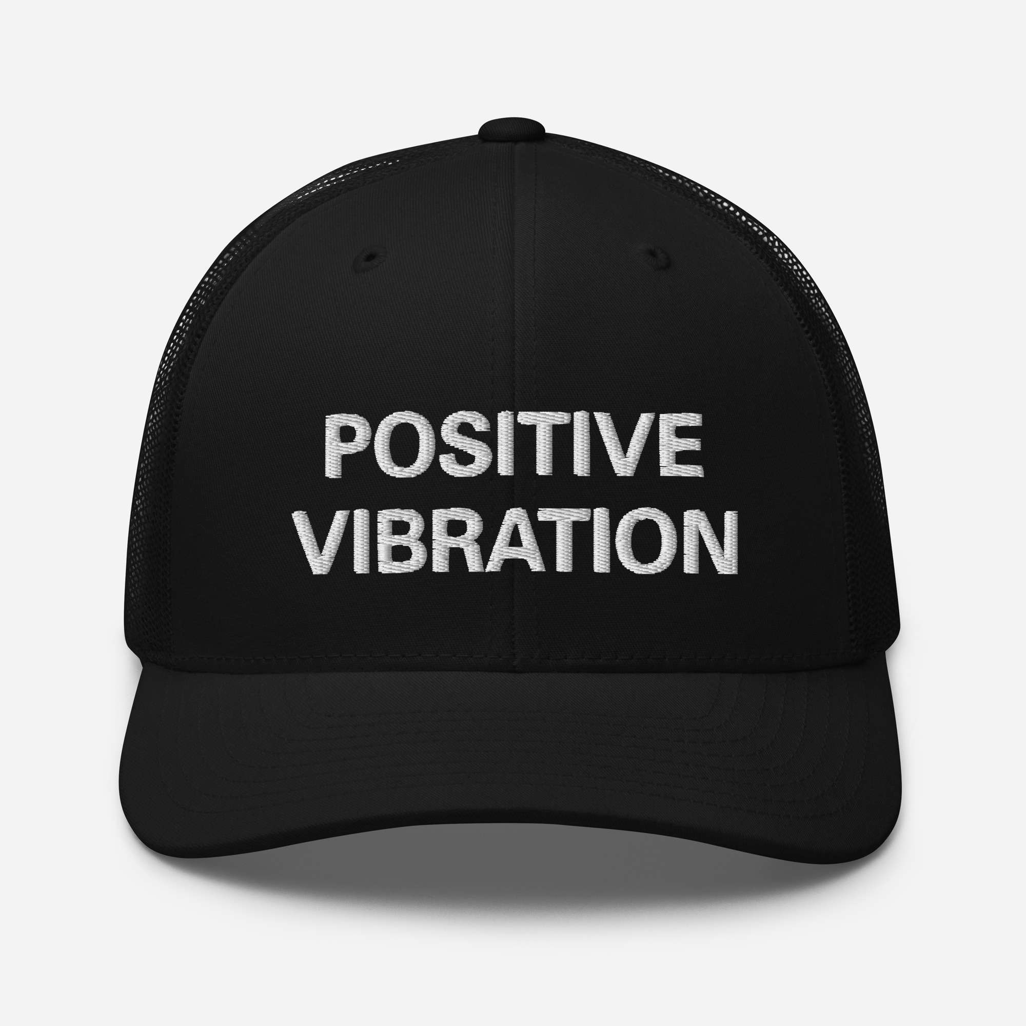 Positive Vibration Rasta Trucker Cap front view in black with mesh back and curved visor Original merchandise at Rastaseed online clothing store.