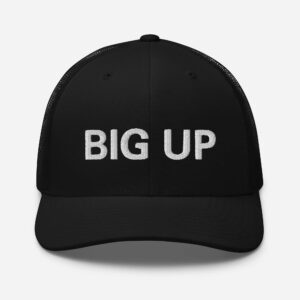 Big Up Jamaican Patois Trucker Cap front view available in black with a mesh back and curved visor. Original Rasta Merchandise and clothing at Rastaseed.