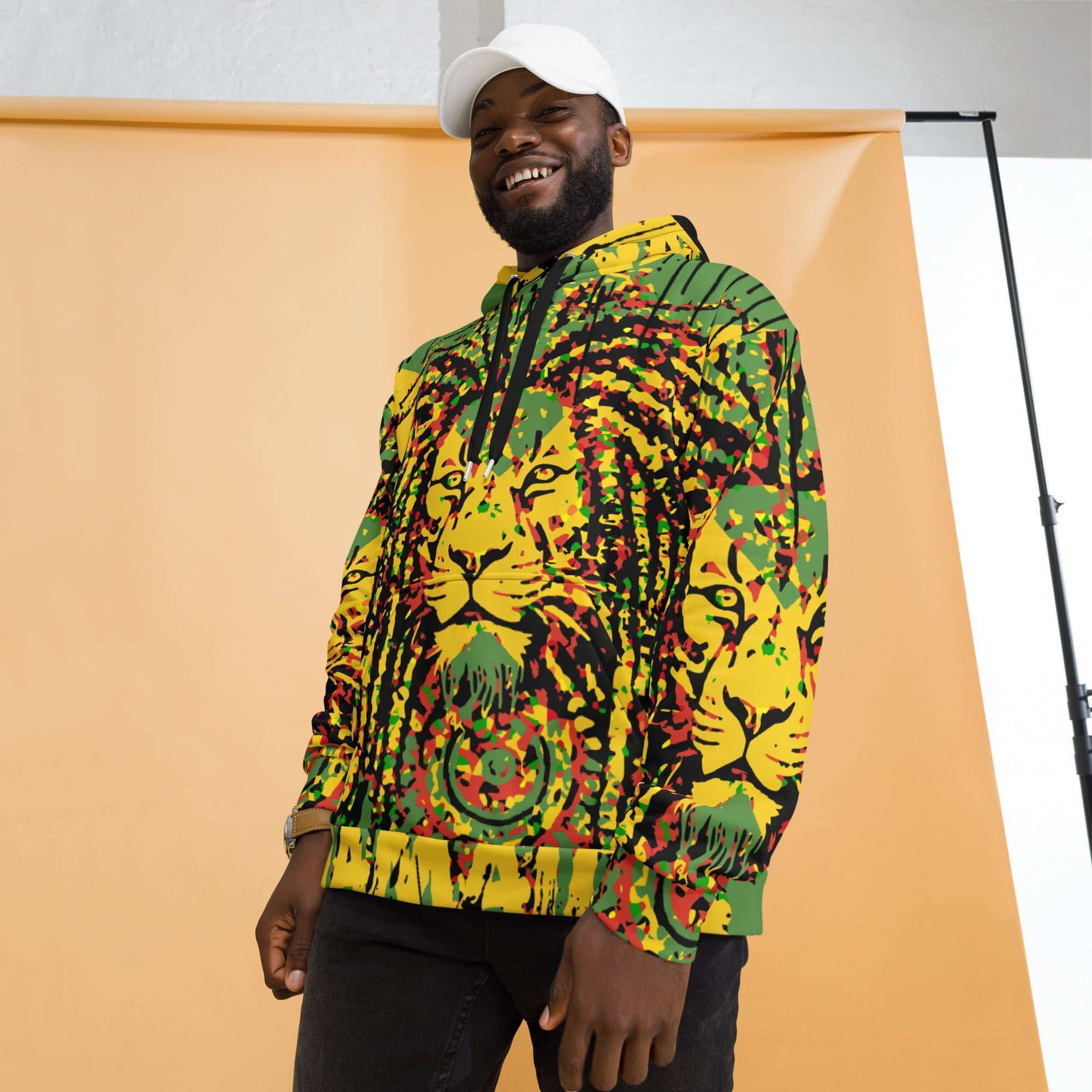 Jamaica Lion Hoodie model view in Jamaican colors with Lion of Judah design. Soft cosy cotton feel fabric with soft fleece lining, double hoodie and front pocket.