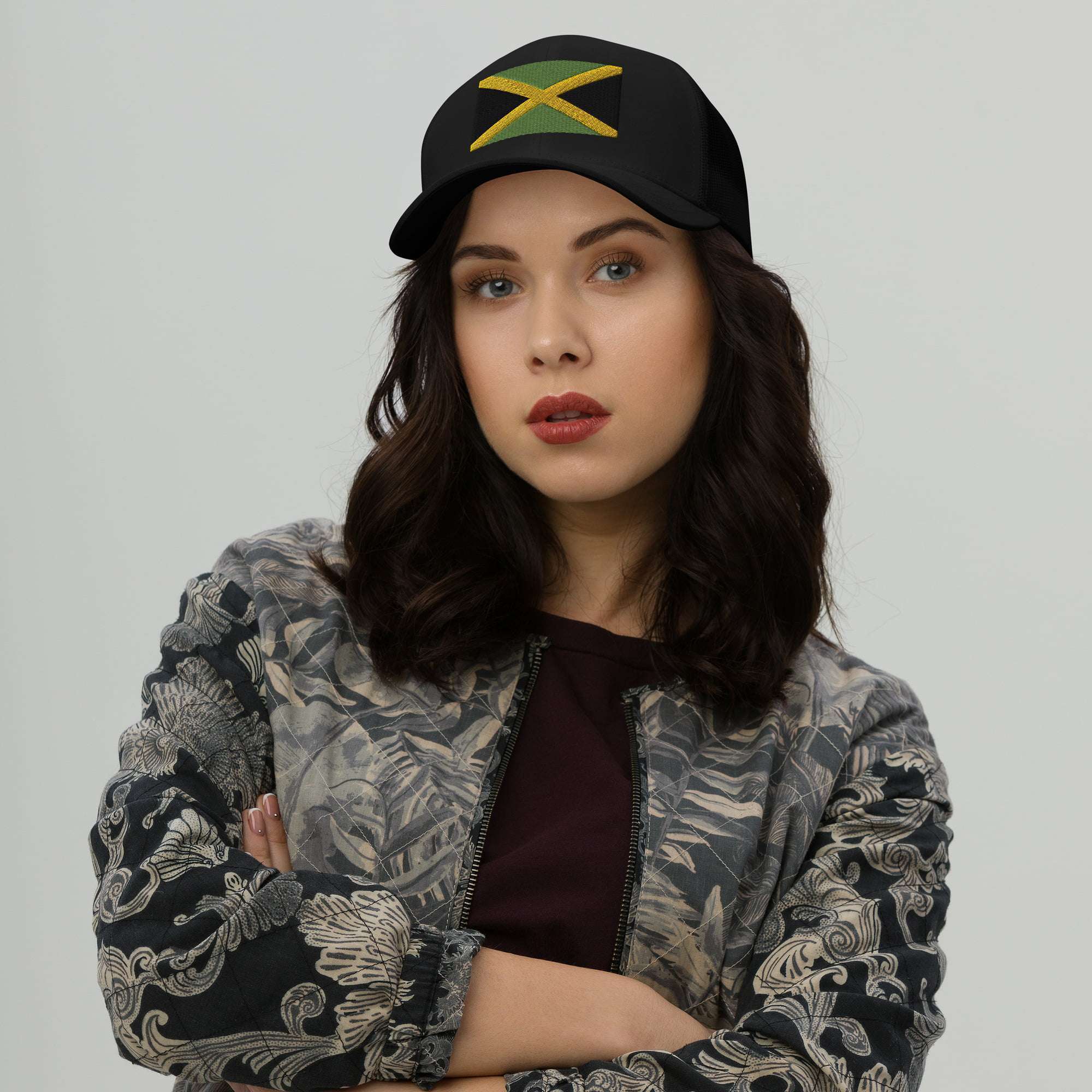 Jamaican cap front female view with the Jamaica flag embroidered across the front. Great for a island vacation lying back on the beach and souvenir.