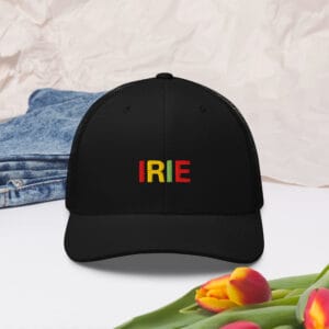 Irie Rasta Trucker Cap front view embroidered in red gold and green letters. Available in black with mesh back and curved visa. Great style from Rastaseed. front