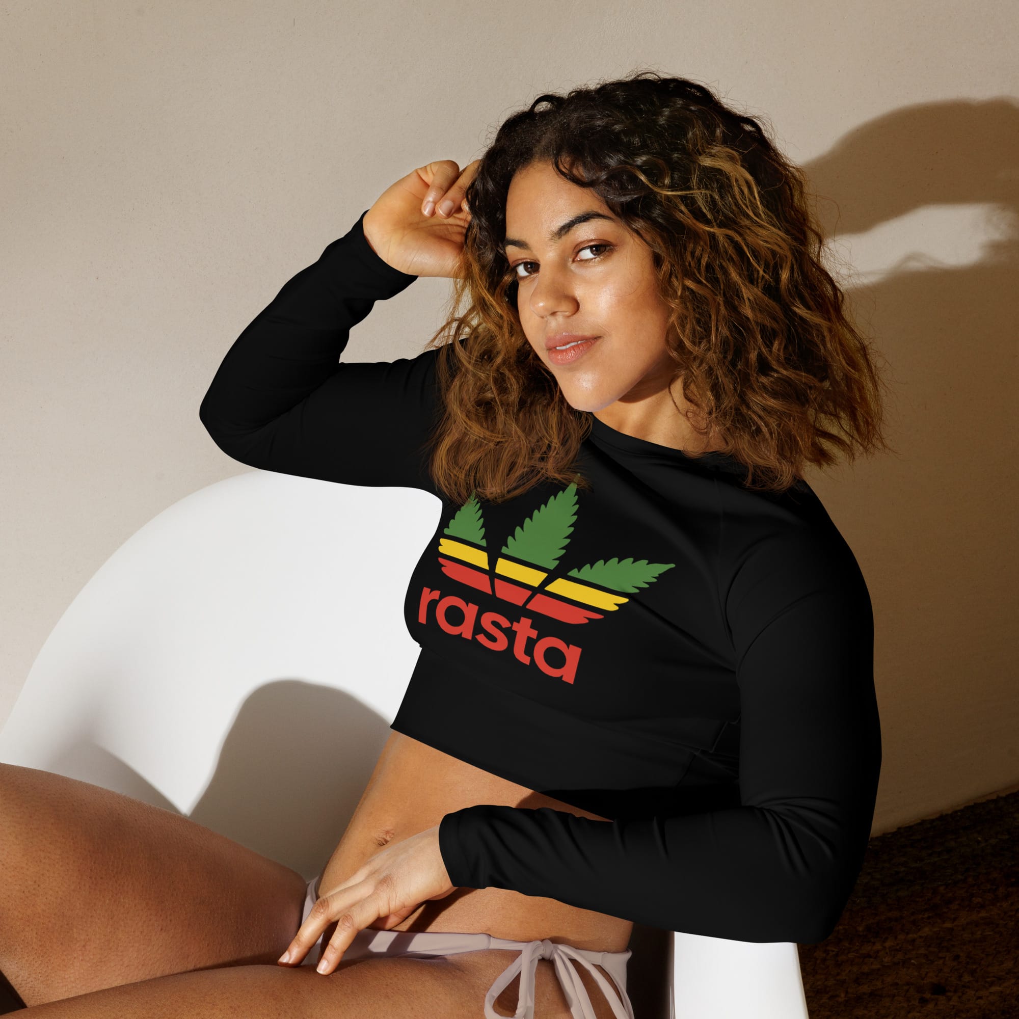 Rasta Leaf Recycled long-sleeve crop top at Rastaseed, Jamaican, Rastafarian, Reggae clothing, merchandise and accessories. model view.